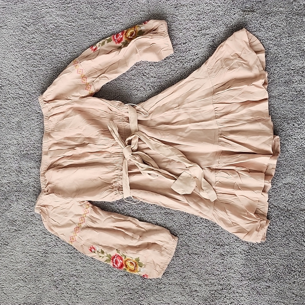 Blush pink Off the shoulder dress with embroidered floral detail.